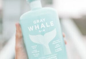 Gray Whale Gin in a man's hand